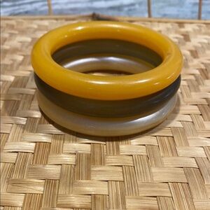 VINTAGE  3 BAKELITE bangles. Golden yellow, olive green, pearlized cream. Retro